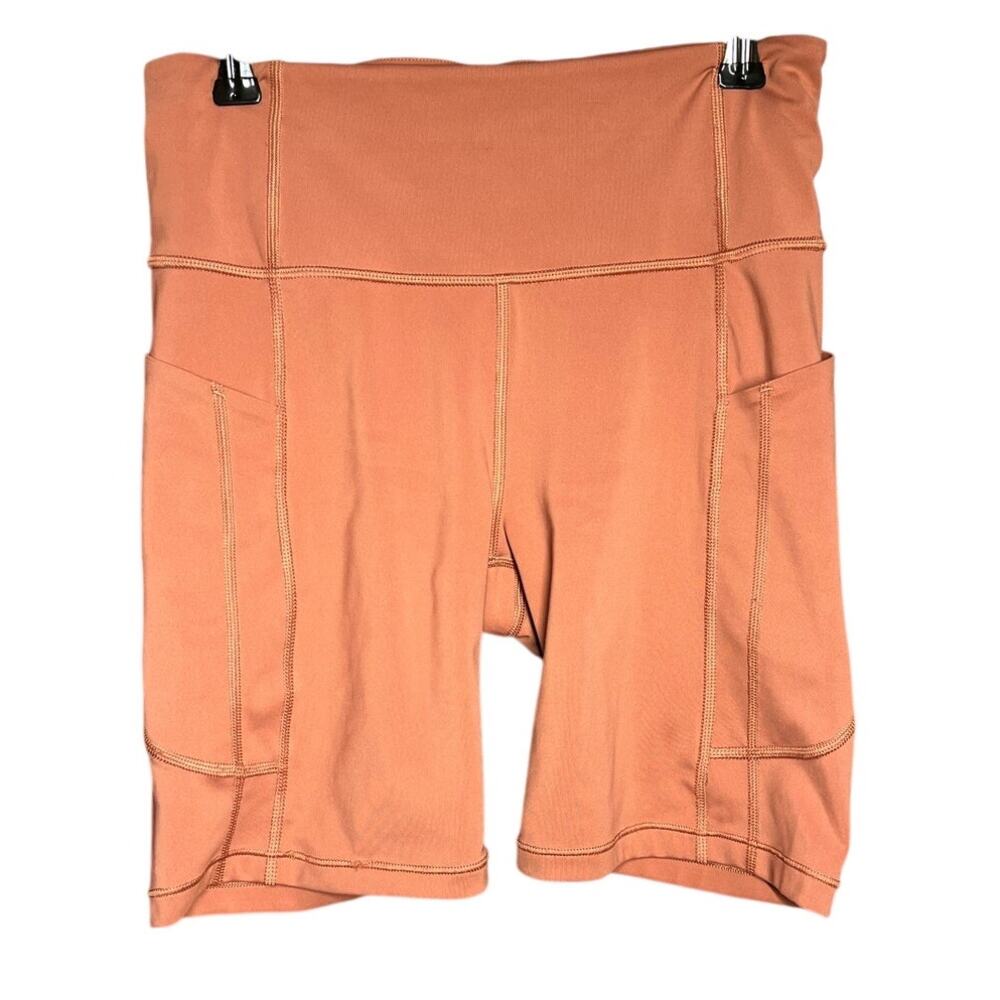 ATHLETA Women's Ultimate Stash II 7" short biker style shorts terra cotta Orange